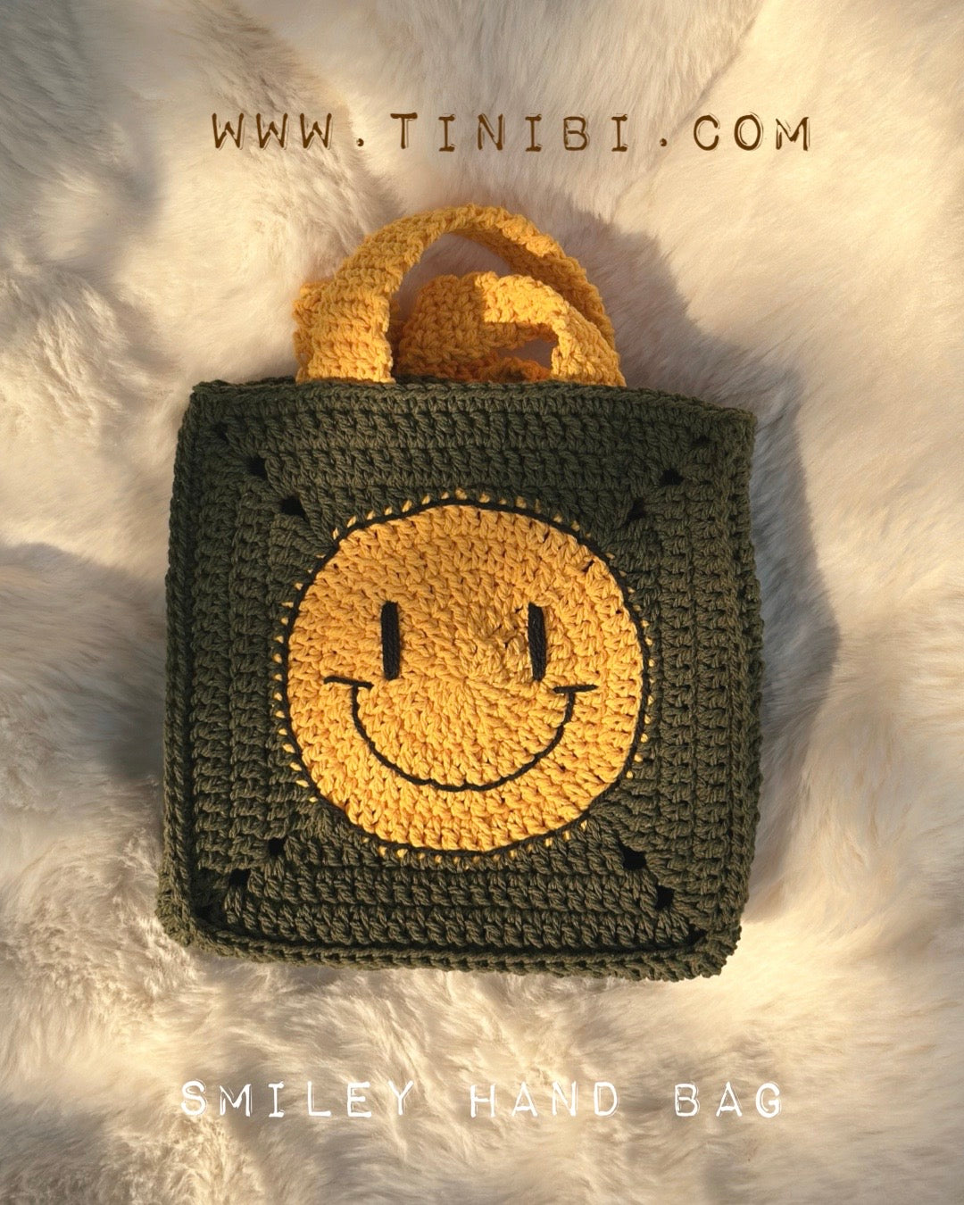 ชื่อสินค้า: : กระเป๋าถือถักมือ ลายหน้ายิ้ม Smiley Hand Bag